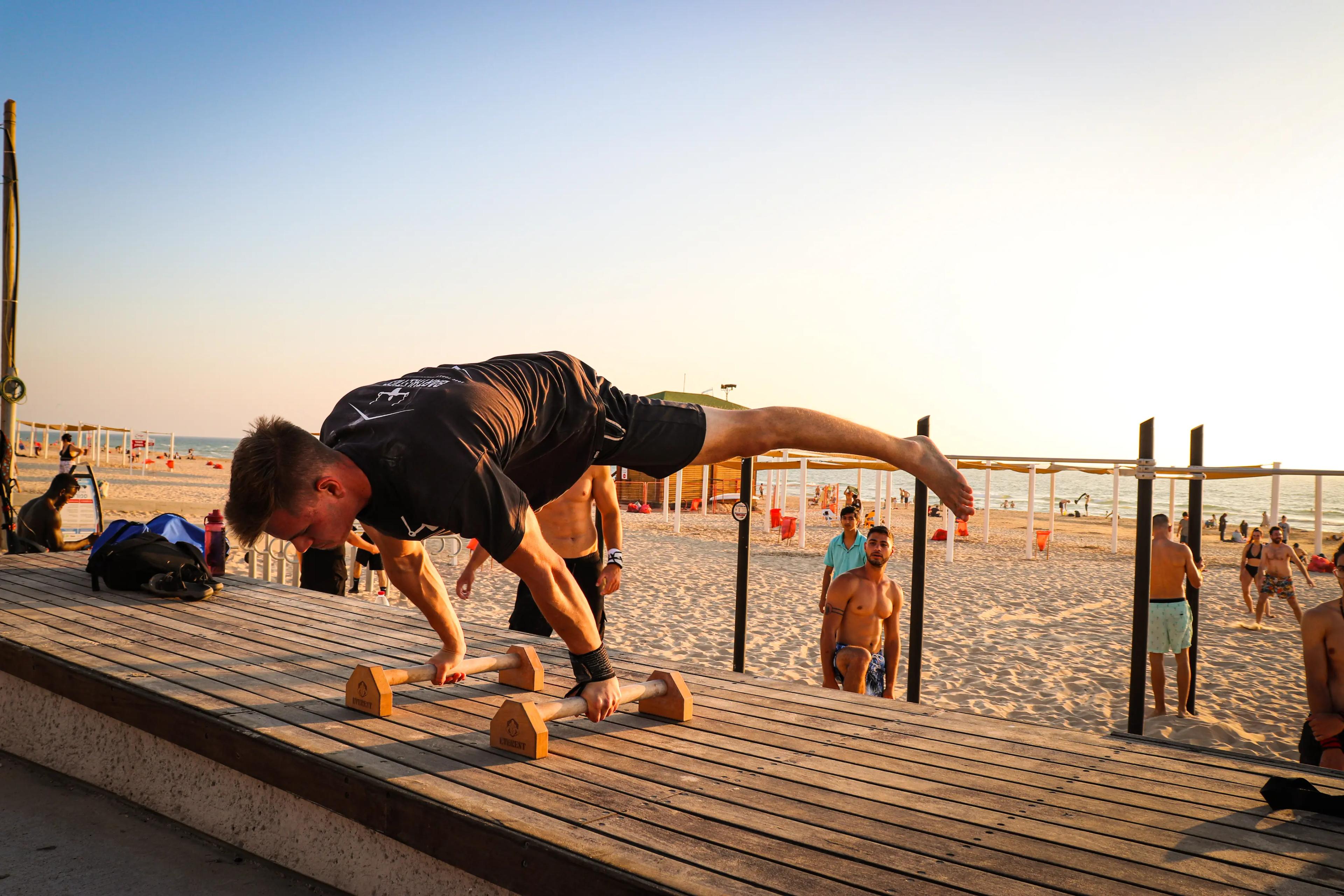 Yaniv Mercher doing the planche exercise in calisthenics.